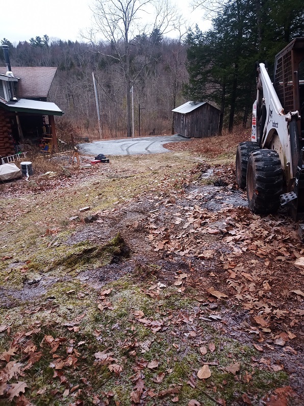 Taken at the top of the hill, looking down over the house on the left and the shed down far to the right.